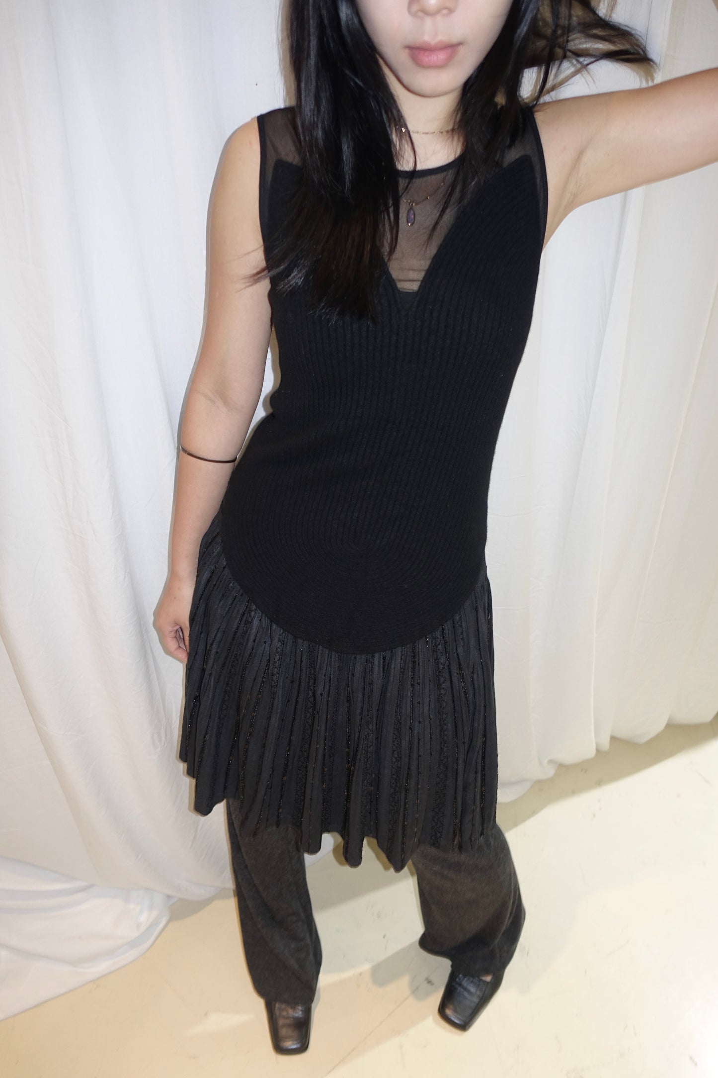 z: Black knit vest