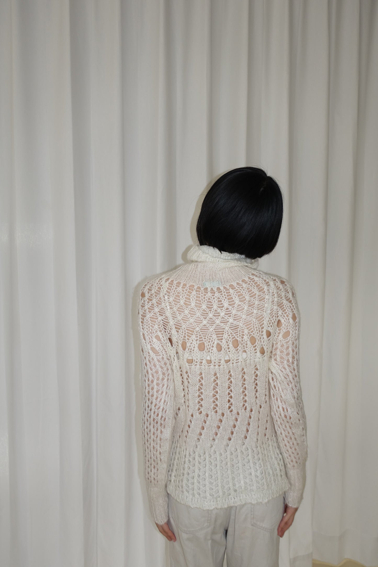 Italian-made white sheer open-knit